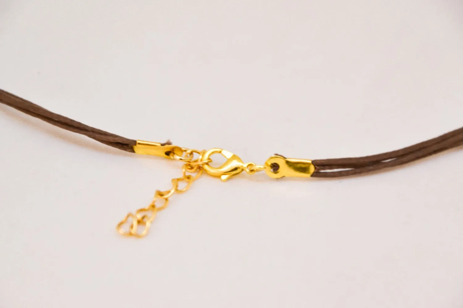 Gold starfish necklace, brown cord, gift for her, nautical jewelry