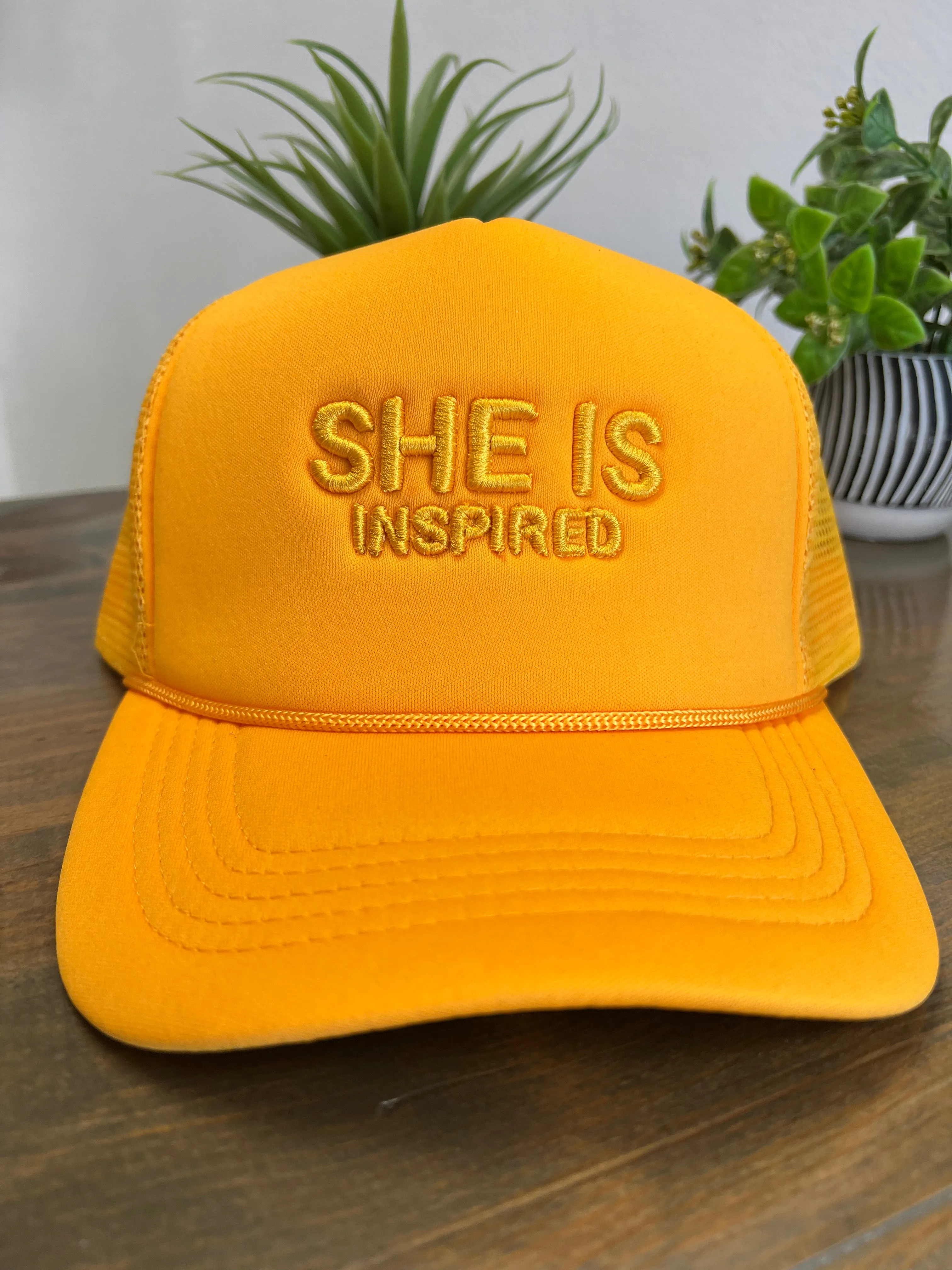 SHE IS INSPIRED trucker hat